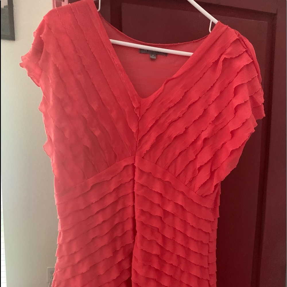 Beautiful shade of orange top!